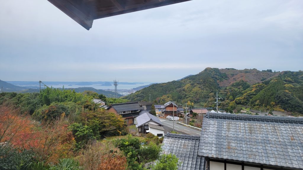 View of the surrounding mountains and sea in the distance